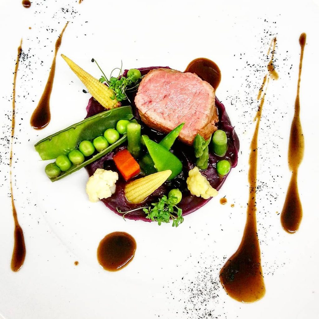 Filet of veal with violette truffle and garden vegetables